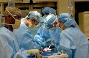 a group of doctors performing surgery in a hospital