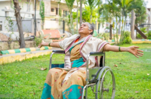 a woman in a wheel chair in a park